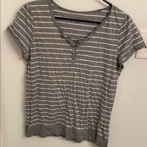 Striped shirt with top buttons